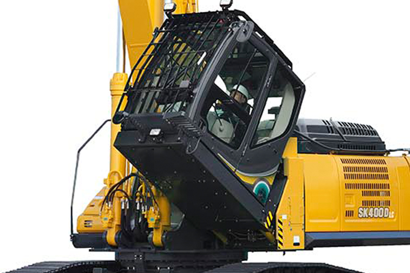 Pictured is a Kobelco SK400DLC demolition excavators cab tilt, one of many great features in Kobelco Excavators.