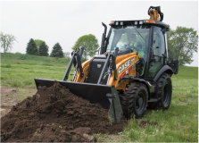 CASE loader backhoe digging up dirt with its bucket on a grassy field, ideal for earth moving rental projects.