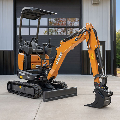CASE CX12D Mini Excavator parked in front of a garage door, sitting on concrete