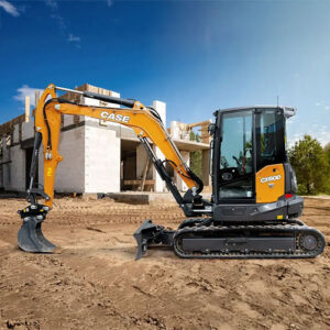 CASE CX60D Mini Excavator sitting on dirt in front of a construction site