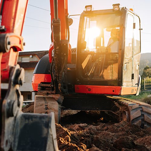 Backhoe excavator on a construction site.